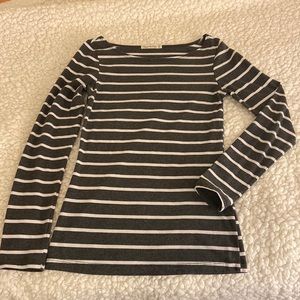 Grey and white striped long sleeve shirt.